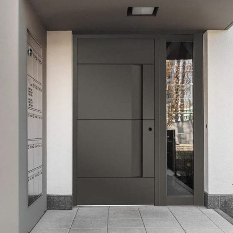 Contemporary entryway featuring a sleek front door with stone accents for a sophisticated and inviting entrance